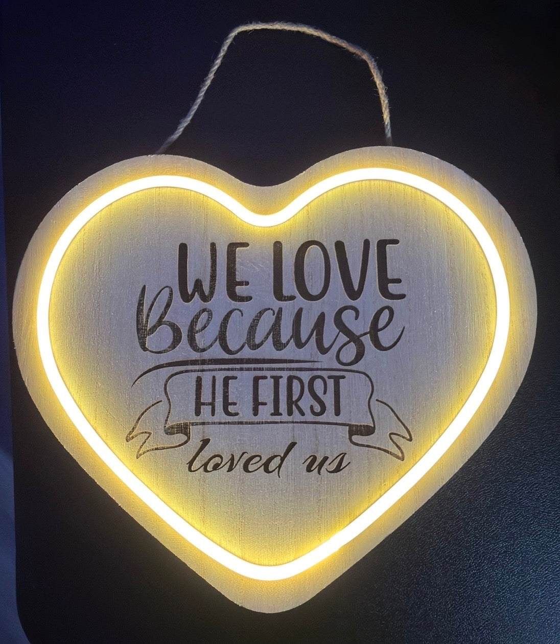 We Love Because He First Loved Us Laser Engraved LED Heart Shaped Laser Engraved Wood Sign