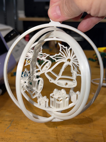 Bells and Gifts Spinning Christmas Ornament